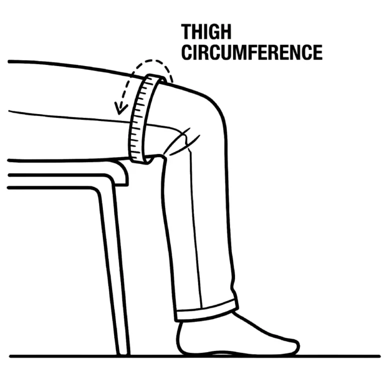 Standing, tape wrapped around the thigh about four inches above the knee